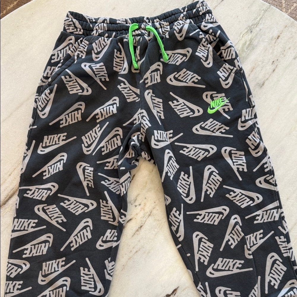 Nike Black Sweatpants with White Logo Print and Neon Green Accents